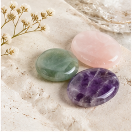 Polished worry stone held in a hand